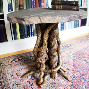 Round table - bittersweet vine base with stone table top by Nancy Reilly of Entangled Furnishings